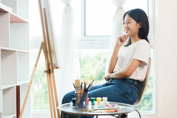 Art Concept Asian Female Artist Sit Front Canvas Thinking Create — Stock Photo, Image