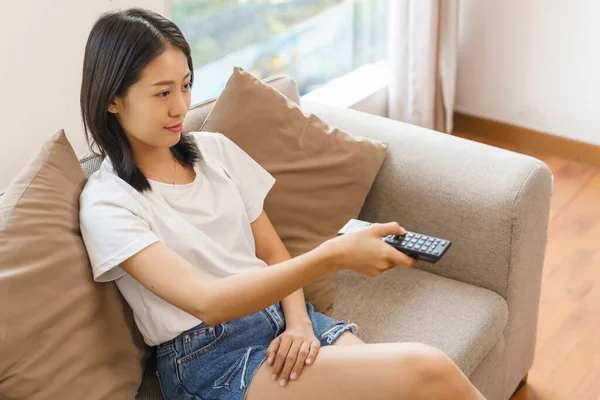 Cozy Lifestyle Concept Young Woman Sit Couch Hold Remote Switch — Stock Photo, Image