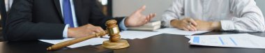 Lawyer and justice concept, Senior lawyer give legal advice regarding legality of business contract.