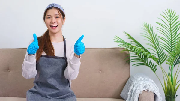 Housekeeping Concept Housemaid Smile Doing Thumbs Gesture Successfully Cleaning House — Zdjęcie stockowe