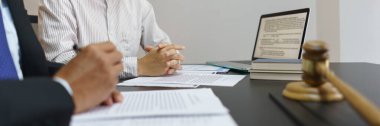Lawyer and legal concept, Senior lawyer explain contract and give legal advice to businessman.