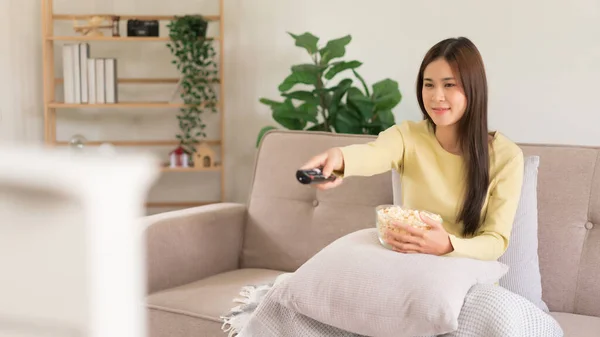 Concept Activity Home Young Woman Holds Remote Control Changing Channel — Stock Photo, Image