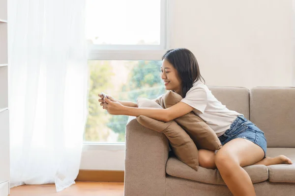 Home Relaxation Concept Young Woman Sitting Couch Use Smartphone Watching — Stock Photo, Image