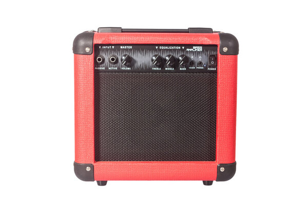 Red bass guitar amplifier isolated on white