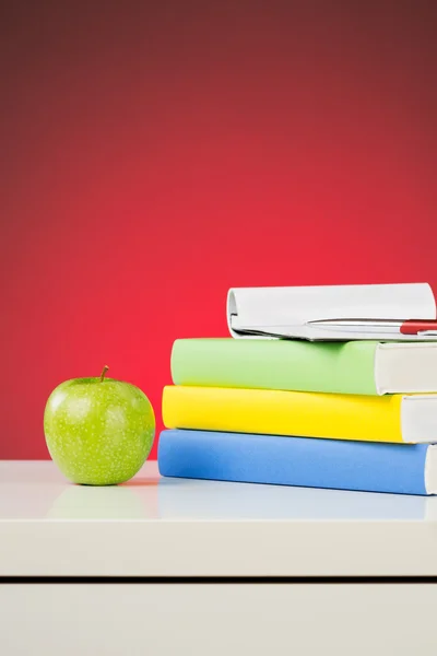 An Apple and Textbooks