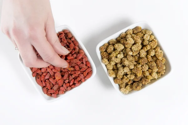 Woman Eat Mulberries and Goji berries — Stock Photo, Image