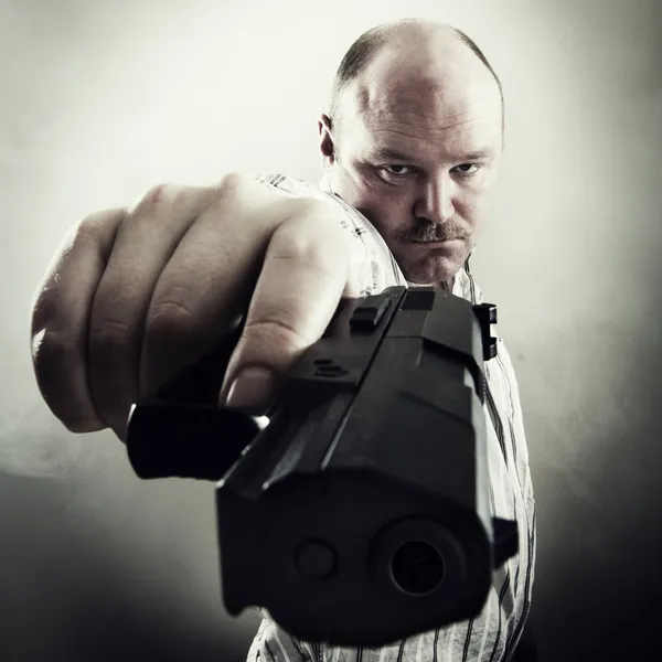 Man med pistol — Stockfoto