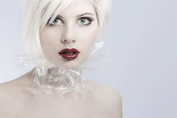 Young futuristic woman model in plastic — Stock Photo, Image