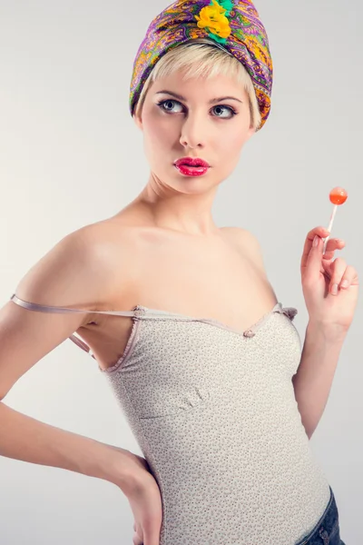 Vintage girl model with lollipop — Stock Photo, Image