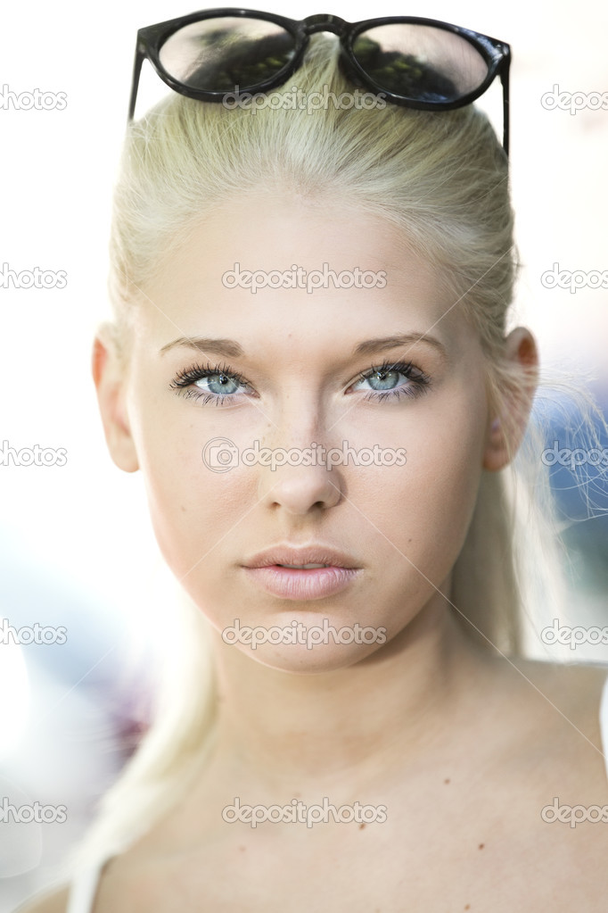 Young blonde teen face portrait