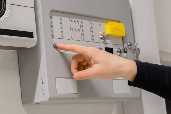 Close Hand Male Electrician Checking Fire Alarm Panel Server Room — Stockfoto
