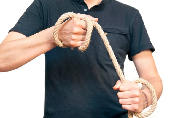 Man Holds Rope His Hands Tries Tighten One Hand Rope —  Fotos de Stock