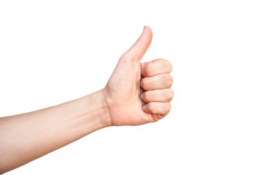 The hand of a man on a white background shows a class with a thumb. The man shows that he is all right. Copy space. Isolated
