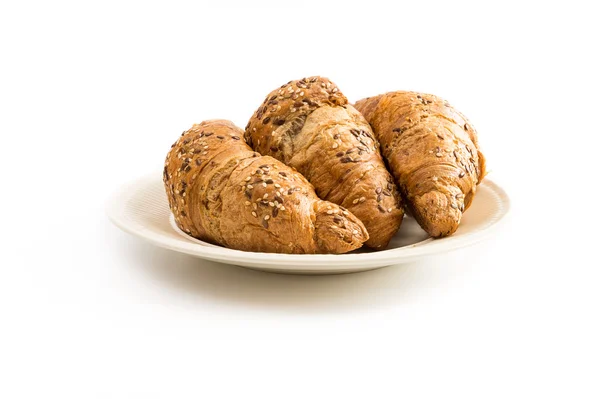 Three rolls on a plate — Stock Photo, Image