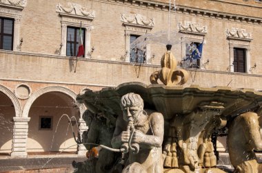 Pesaro Italy fountain in the plaza of the people clipart