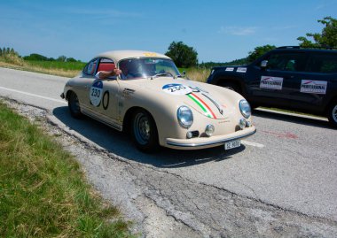 URBINO - ITALY - JUN 16 - 2022 : PORSCHE 356 A 1500 GS CARRERA 1956 on an old racing car in rally Mille Miglia 2022 the famous italian historical race (1927-1957