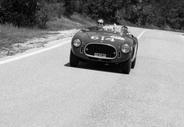 URBINO - ITALY - JUN 16 - 2022 : FERRARI 340 AMERICA SPIDER VIGNALE 1952 on an old racing car in rally Mille Miglia 2022 the famous italian historical race (1927-1957
