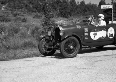 URBINO - ITALY - JUN 16 - 2022 : BUGATTI T40 1929 on an old racing car in rally Mille Miglia 2022 the famous italian historical race (1927-1957