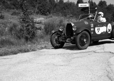 URBINO - ITALY - JUN 16 - 2022 : BUGATTI T40 1929 on an old racing car in rally Mille Miglia 2022 the famous italian historical race (1927-1957
