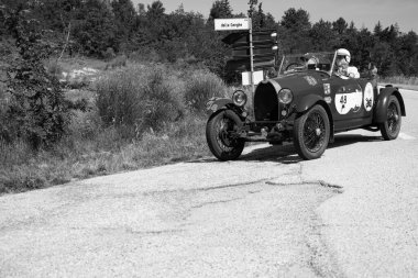 URBINO - ITALY - JUN 16 - 2022 : BUGATTI T40 1929 on an old racing car in rally Mille Miglia 2022 the famous italian historical race (1927-1957