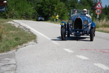 URBINO - ITALY - JUN 16 - 2022 : BUGATTI T40 1929 on an old racing car in rally Mille Miglia 2022 the famous italian historical race (1927-1957