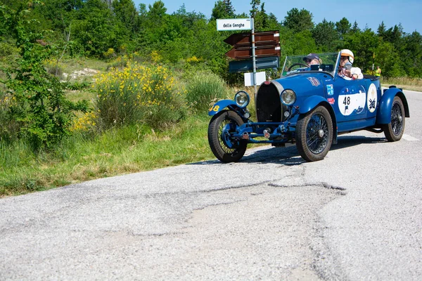 URBINO - ITALY - JUN 16 - 2022 : BUGATTI T40 1929 on an old racing car in rally Mille Miglia 2022 the famous italian historical race (1927-1957