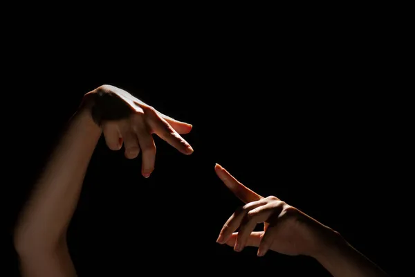 Duas mãos tocam-se com um dedo, o momento da criação, o conceito divino do momento da criação. — Fotografia de Stock