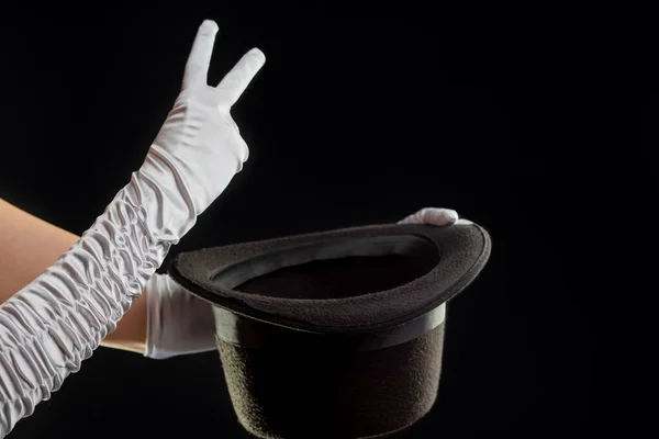 Hand gestures. The magician shows tricks with a hat. — Stock Photo, Image