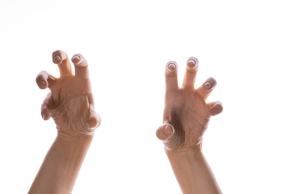 Mâinile zombie atacă, apucând ceva mâini cu degete strâmbe — Fotografie, imagine de stoc