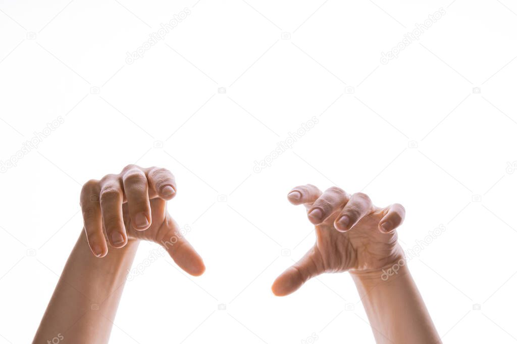 Hands of the puppeteer for editing, hands hanging from above, isolated on a white background