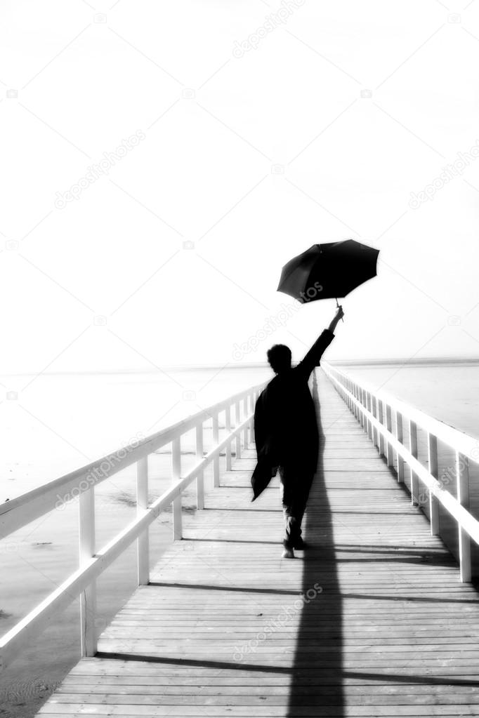 Man walking on the bridge