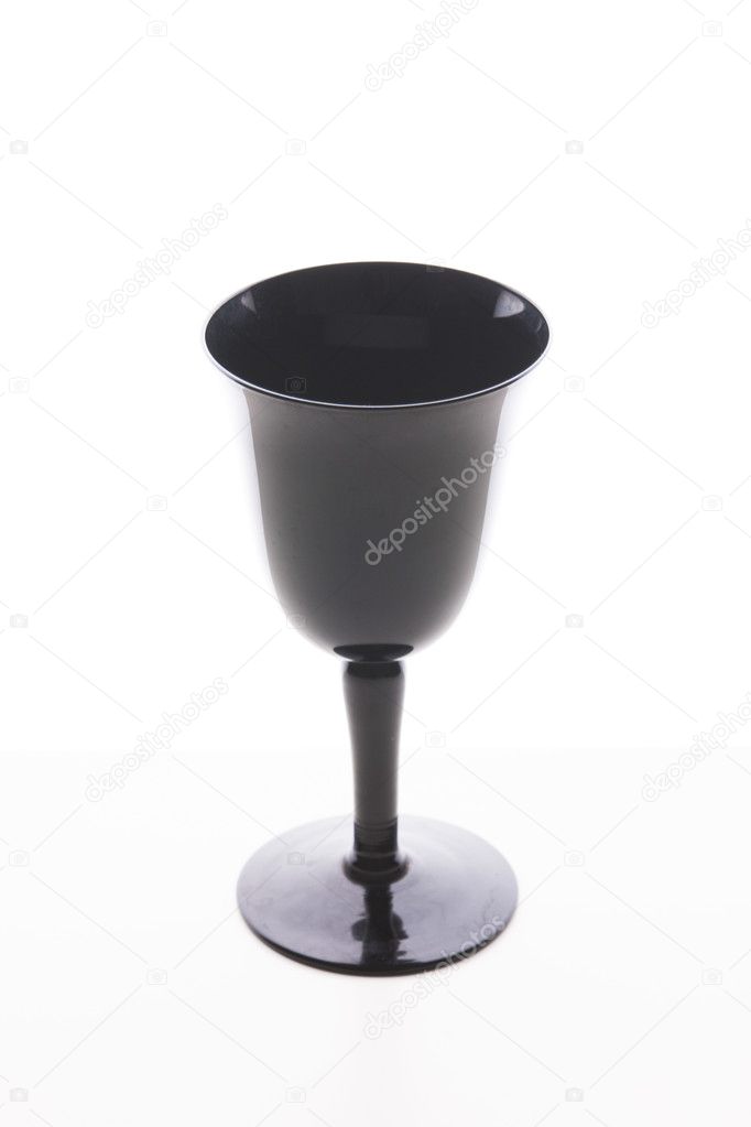 Black wine glass on white background