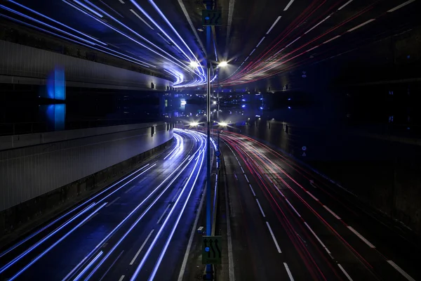 Light trail view at a busy highway — Stock Photo, Image