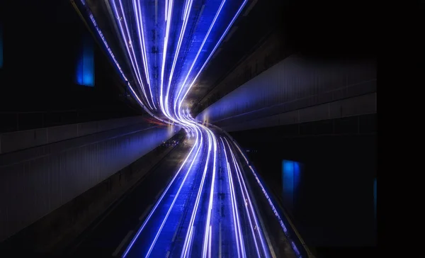 Light trail view at a busy highway — Stock Photo, Image