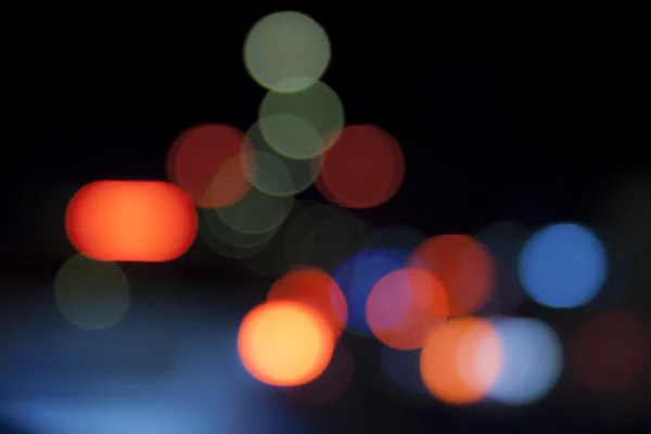 Bokeh, lampu defocused dalam lalu lintas — Stok Foto