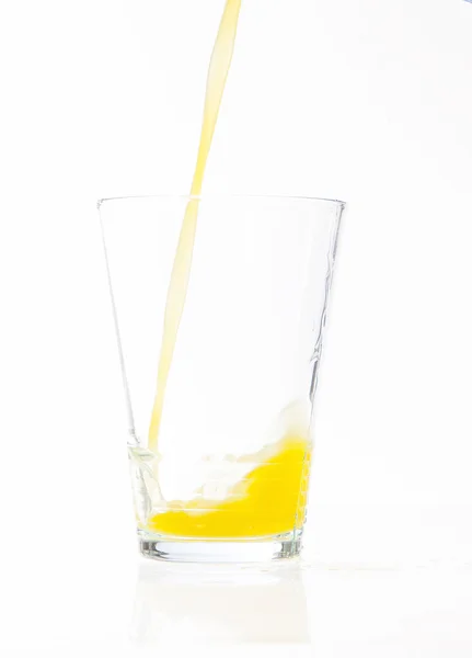 Copo de suco de laranja em estúdio — Fotografia de Stock