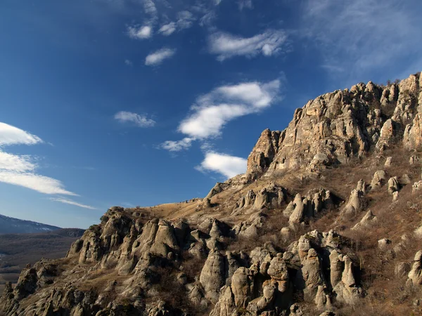 Rocks and clouds — Stock Photo, Image