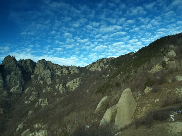 Rocks and clouds — Stock Photo, Image