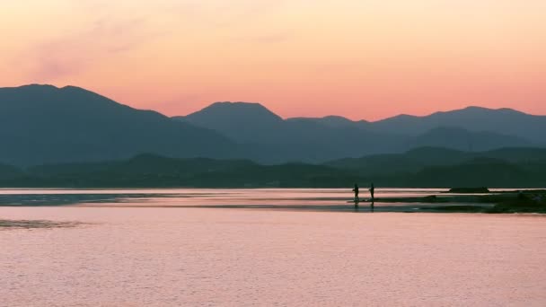 The fisherman, sunset, sea, sun — Stock Video