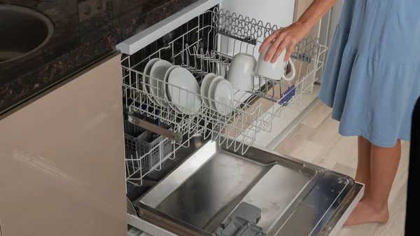 Housewife Takes Clean Cups Out Dishwasher — Stock Photo, Image