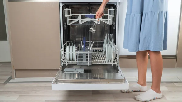 Housewife Loads Dishwasher Dirty Dishes — Stock Photo, Image