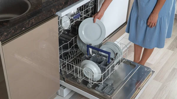 Housewife Pulls Clean Plates Out Dishwasher Close — Stock Photo, Image