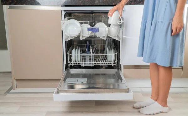 Housewife Removes Clean Dishes Dishwasher Front View — Stock Photo, Image
