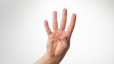 Erkekler el hareketi parmaklarının dört avuç içini de sayar. Yüksek kalite fotoğraf