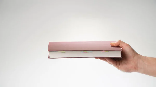 Hand Reaches Out Book Horizontally Pages Visible High Quality Photo — Stock Photo, Image