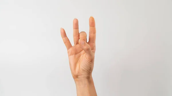 Sign language of the deaf and dumb people, number, digit eight. High quality photo