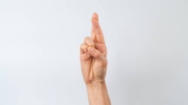 Sign language of the deaf and dumb people, English letter r. High quality photo