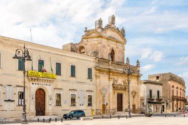 MANDURIA,ITALY - SEPTEMBER 4,2021 - View at the Carmine Church and Town hall of Manduria. Manduria is a city and comune of Apulia, Italy, in the province of Taranto. clipart