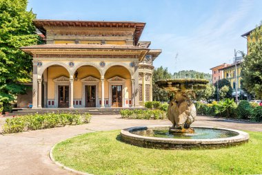 MONTECATINI TERME,ITALY - SEPTEMBER 10,2021 - View at the Building Spa Terme Excelsior in Terme. Montecatini Terme is an Italian municipality in the province of Pistoia, Tuscany, central Italy. clipart