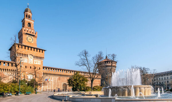View at the Sforzeco Palace with Fountain in the streets of Milan in Italy